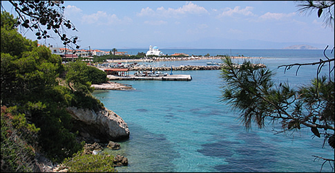 View on the harbour and church of Skala